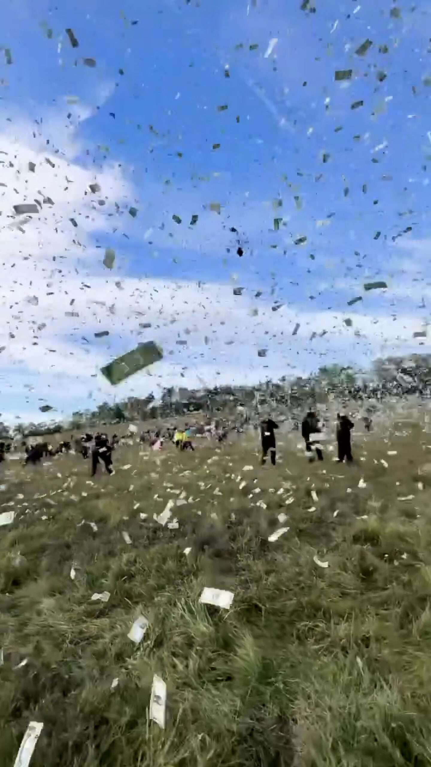 Read more about the article Influencer Drops USD 1 Million From Helicopter Onto Fans In Field